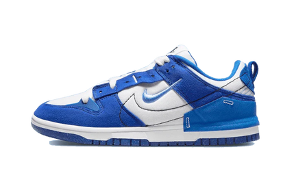 Dunk Low Disrupt 2 White University Blue (W) - Trinity Sneakers